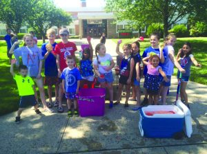 Local kids loading up for Stewart Manor Fourth of July parade   (Photo by Christy Hinko)