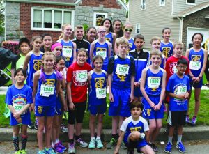 May 2016 TSC members prior to the Hance 5k in Floral Park Top Row: Aidan Ke, Ishil Kirkhan, Kenny Procacci, Olivia Spirakis, Sophia Muccini, Andrew Addison, Michelle Ashbahian, Helen Moloney, Lauryn Heskin, Emilee Becker, Jacqueline Kelly, Alex Addison, Connor Ronan, Rosie Harnett, Chris Skahill and Caroline Chun Bottom Row: Fiona So, Siena Muccini, Caralinn Becker, Courtney Skahill, Lorelei Krapf, Owen Moloney, Mac Krapf, Owen O’Donnell and Mahir Lalwani