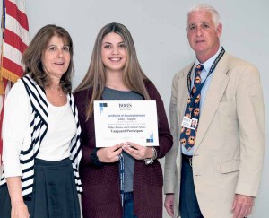 Hicksville student Ashley Chappell (center) earned the 2016 Vanguard Award from Nassau BOCES Barry Tech. She is congratulated by Barry Tech Principal Laurie Harris (left) and Nassau BOCES Board Member Michael Weinick.