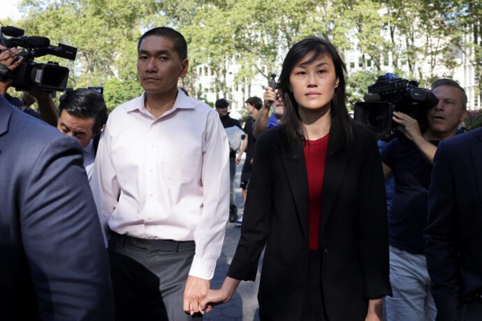 Linda Sun, a former aide to New York State Governor Kathy Hochul, exits Brooklyn Federal court with Christopher Hu after Sun was charged with acting as an unregistered agent of China's government, in New York City, Sept. 3