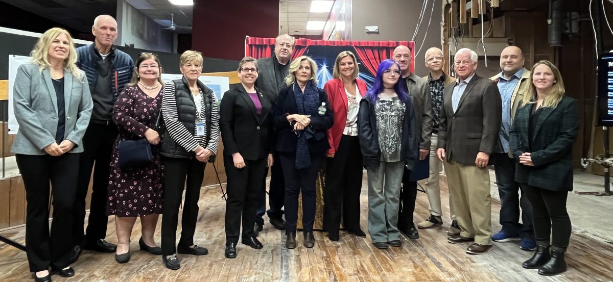 Local officials and businessowners welcome North Shore Village Theatre to 19 Glen St (Photo provided by the Glen Cove Downtown Business Improvement District)