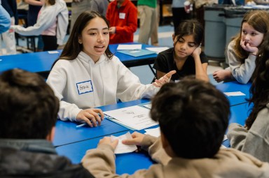 Students from Bethpage High School who are part of the Athletes Helping Athletes program made their first of three mentoring visits to Charles Campagne School on Dec. 12. The program brings high school athletes back to their roots as they mentor fifth graders at their former elementary schools.