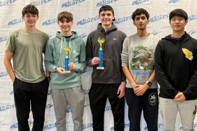 Roslyn High School students won first and second place trophies at annual Physics Olympics.