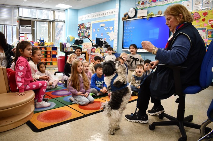 Sam the Service Dog and his human Rita at Shelter Rock Elementary School