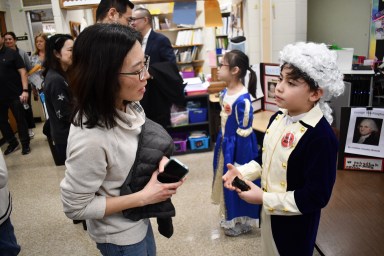 dancers, queens, judges, presidents, star athletes and other historical figures as they presented their wax museum research projects to visiting parents.