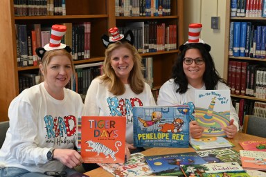Hicksville english teacher Diane Newcombe-Lypen, High School librarian Christine Anderson and english teacher Dena Civello, L to R