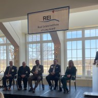 Panelists Dan Panico, Ralph Ekstrand, Anthony Bartone, David Pennetta and Cara Longworth, left to right, at REI spring luncheon on March 13, 2025