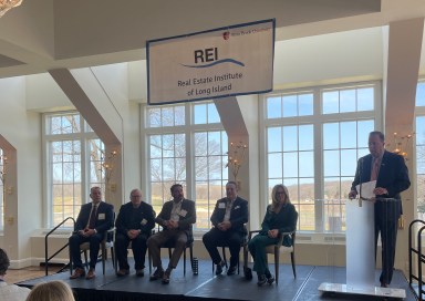 Panelists Dan Panico, Ralph Ekstrand, Anthony Bartone, David Pennetta and Cara Longworth, left to right, at REI spring luncheon on March 13, 2025