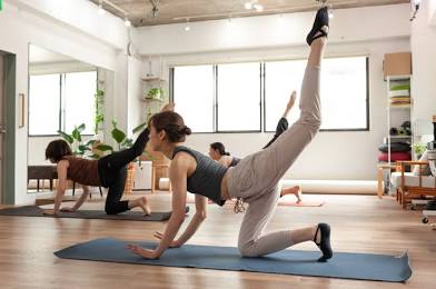 Synergy offers different exercises using machines, mats and stools