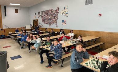 Island Tees elementary schoolers participating in morning chess club