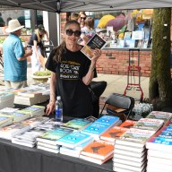 Vendors lined the streets of downtown Oyster Bay at the Gold Coast Book Fair's outdoor marketplace last year.