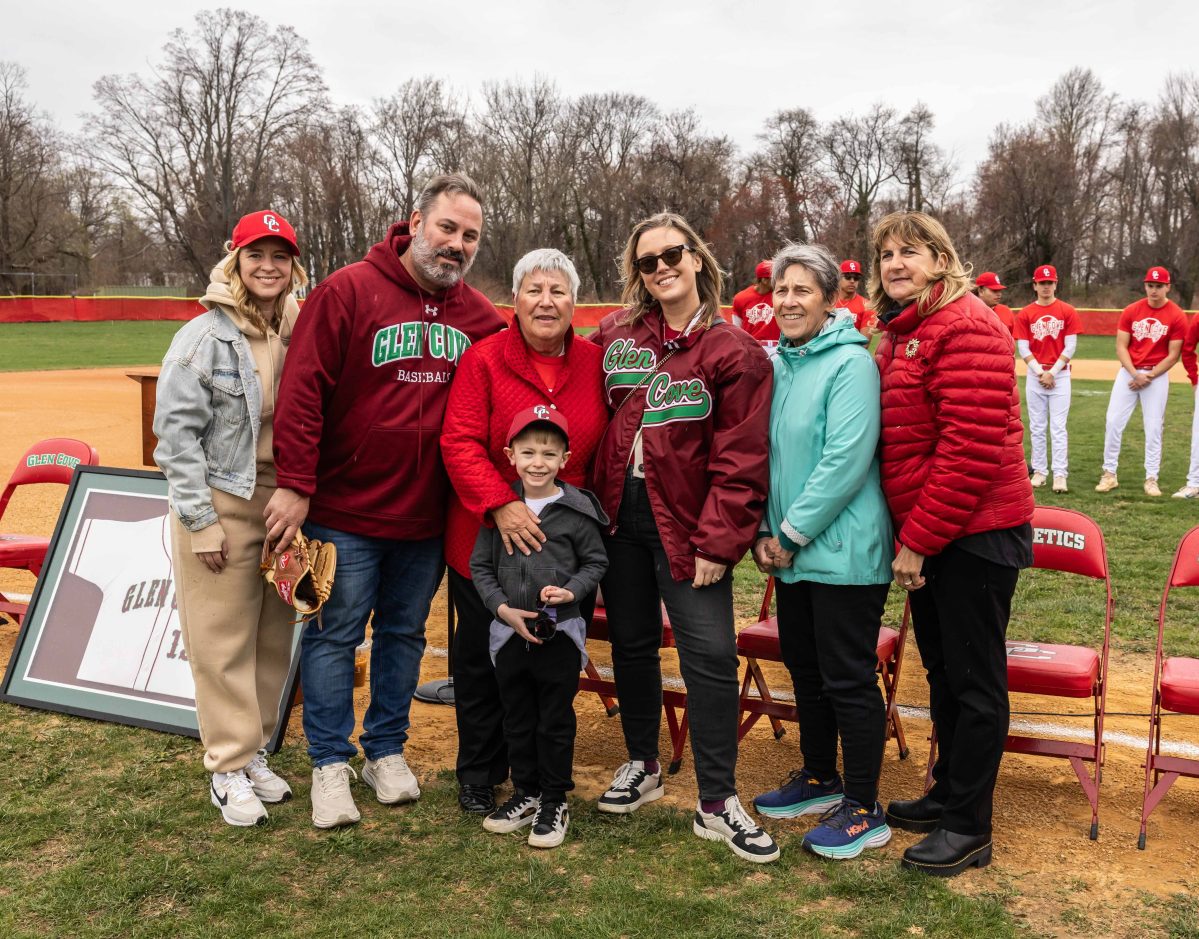 Jon Dolecki's wife Irene (center), children and grandson celebrate his legacy at the Saturday, April 5 field renaming