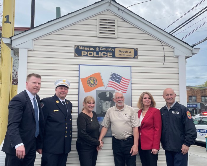 The Village of New Hyde Park and the Nassau County Police Department dedicated the police booth on Lakeville Road to Patrolman Alexander Benedict.