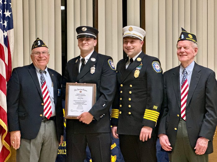 Manhasset-Lakeville firefighter Michael Fiala (center left) was one of 12 first responders honored by the Manhasset American Legion Post 304