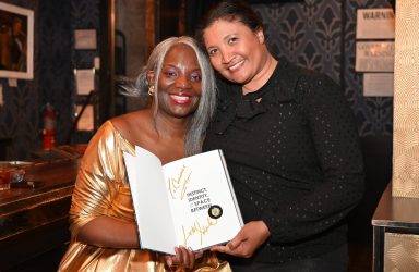 Image 1 (Cover Pic) Author Dr. Subrina Oliver, CEO of O-High Technologies, LLC. & Dr Corrine Graham signing her book for Dr. Corrinne Graham (Photo by Ed Shin)