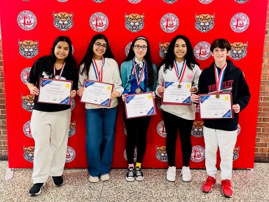 East Williston students with awards.