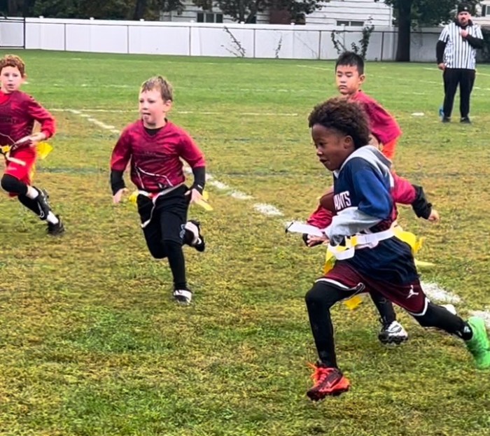 Players in the Roslyn Flag Football League develop athletic skills while making new friends from different schools.