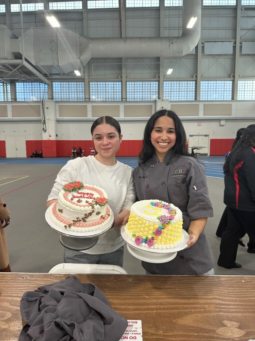 Sewanhaka students with a cake.