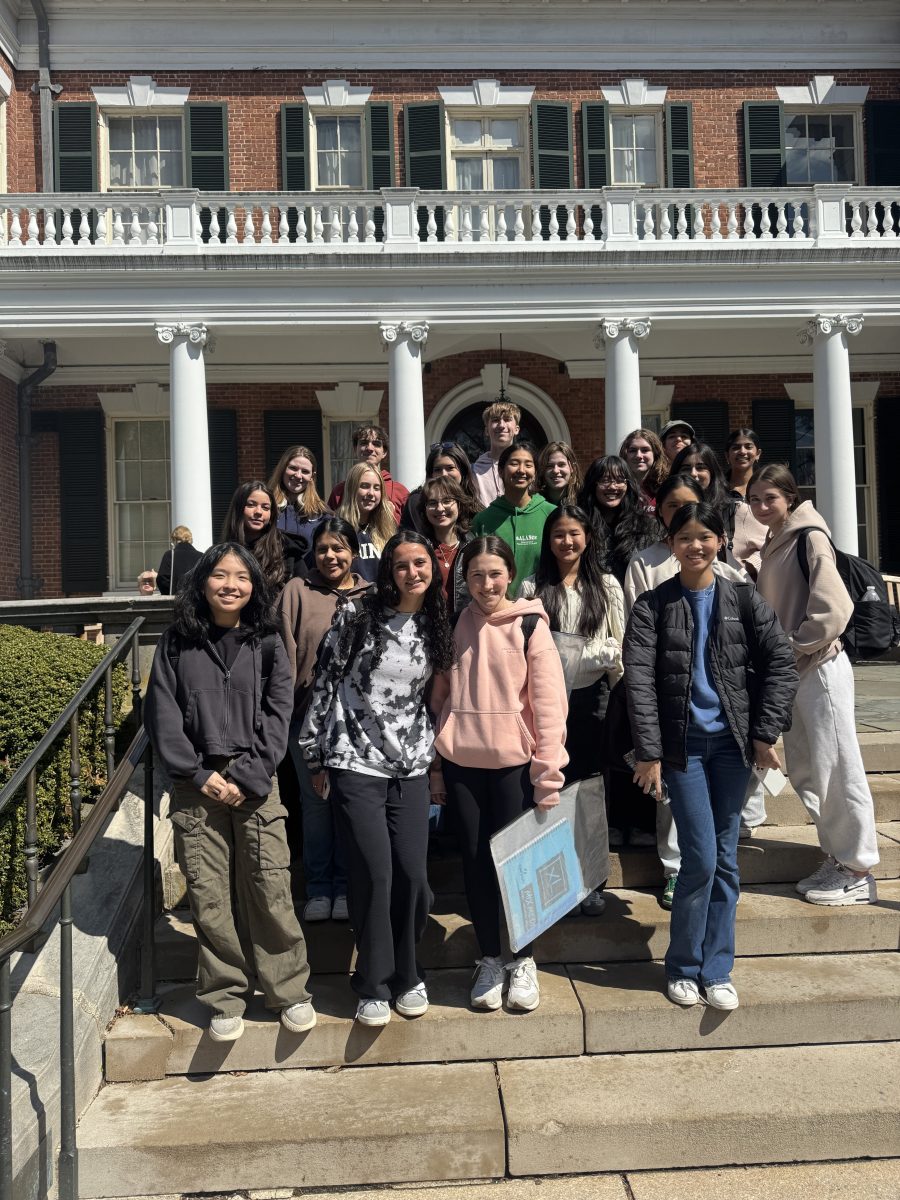 Wheatley School students standing in front of an art museum.