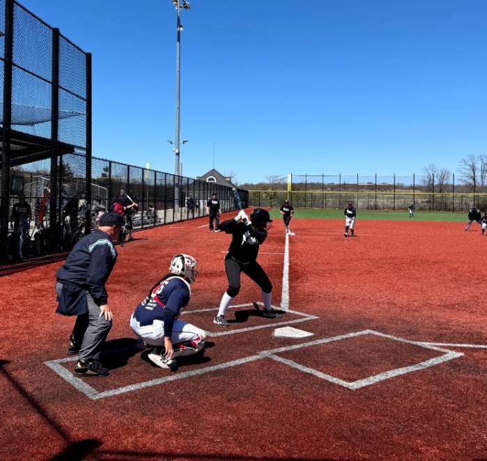 Ella Lanza hitting for Syosset at the Corey's Promise Charity Softball Tournament on Thursday, April 17