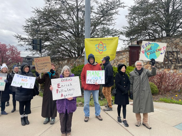 Protestors call for environmental protection as EPA head Lee Zeldin speaks on Friday, April 11 at the Crest Hollow Country Club in Woodbury