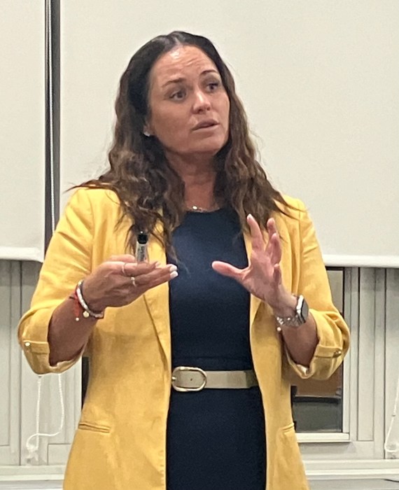 Carle Place principal speaking.