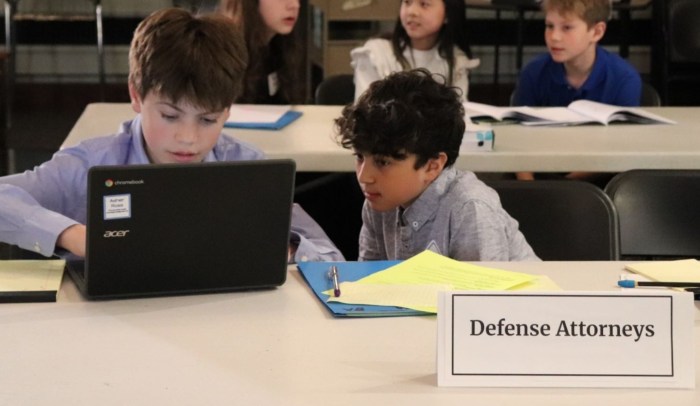 Students like Asher Ross and Kiran Cherena turned into defense attorneys for the pretend mother of the suing child star during Weber Middle School's mock trial event.