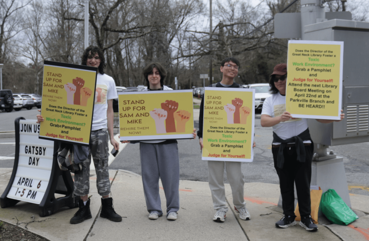 Teenagers rallied outside the Great Neck Library on April 6, demanding that two employees from the teen Levels program be re-hired