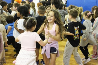 Three-time Grammy nominee Brady Rymer and his band rocked Heights Elementary School with a high-energy concert.