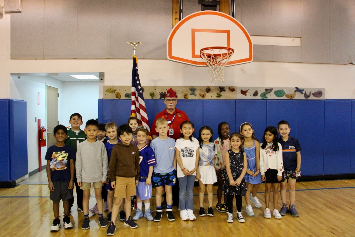 Steven McManus with first-graders at Roslyn's Heights Elementary School.