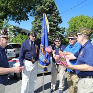 Members of the Syosset VFW post prepare for the Memorial Day parade and ceremony
