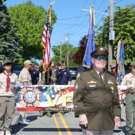 Phil Rhoads, junior vice commander, leads the VFW through the parade route