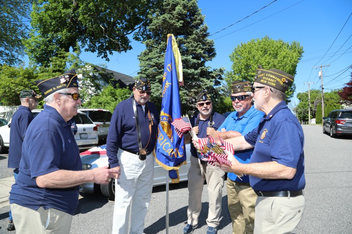 Members of the Syosset VFW post prepare for the Memorial Day parade and ceremony