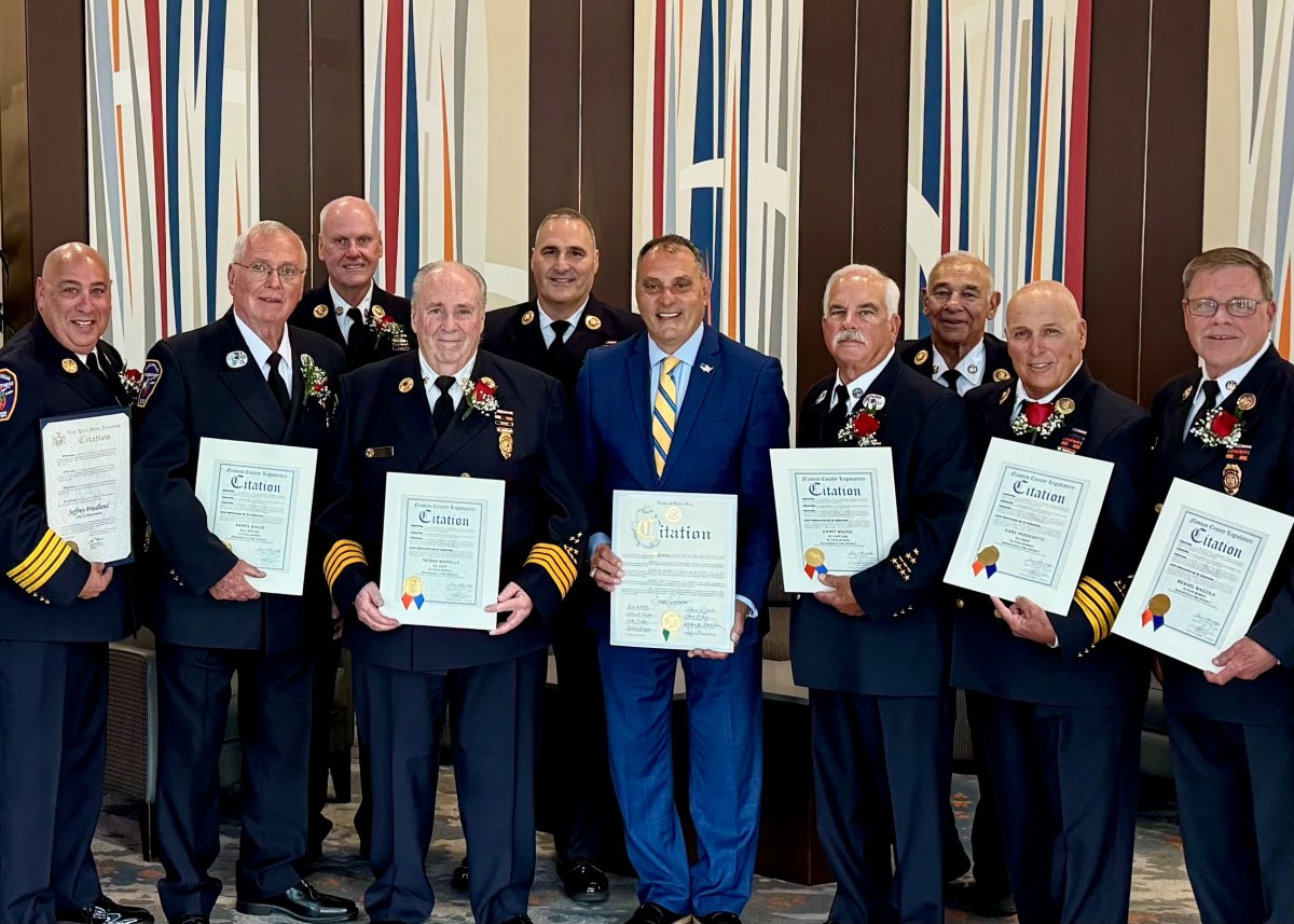 Oyster Bay Town Supervisor Joseph Saladino honored six Massapequa firefighters