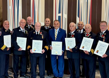 Oyster Bay Town Supervisor Joseph Saladino honored six Massapequa firefighters
