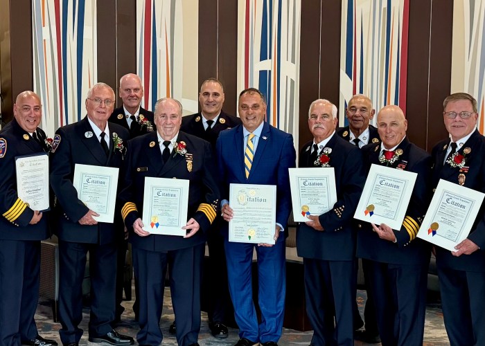 Oyster Bay Town Supervisor Joseph Saladino honored six Massapequa firefighters