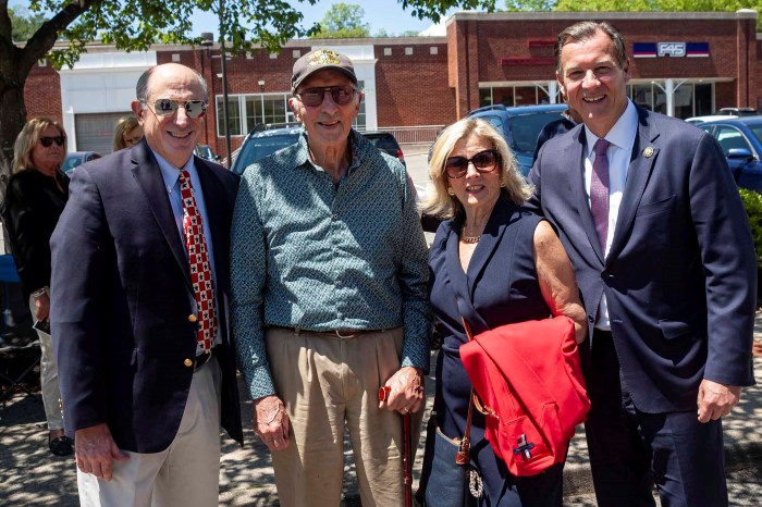 Ralph Suozzi, Donald DeRiggi, Pamela Panzenbeck and Tom Suozzi (L. to R.) reunite at Glen Cove's Memorial Day parade.