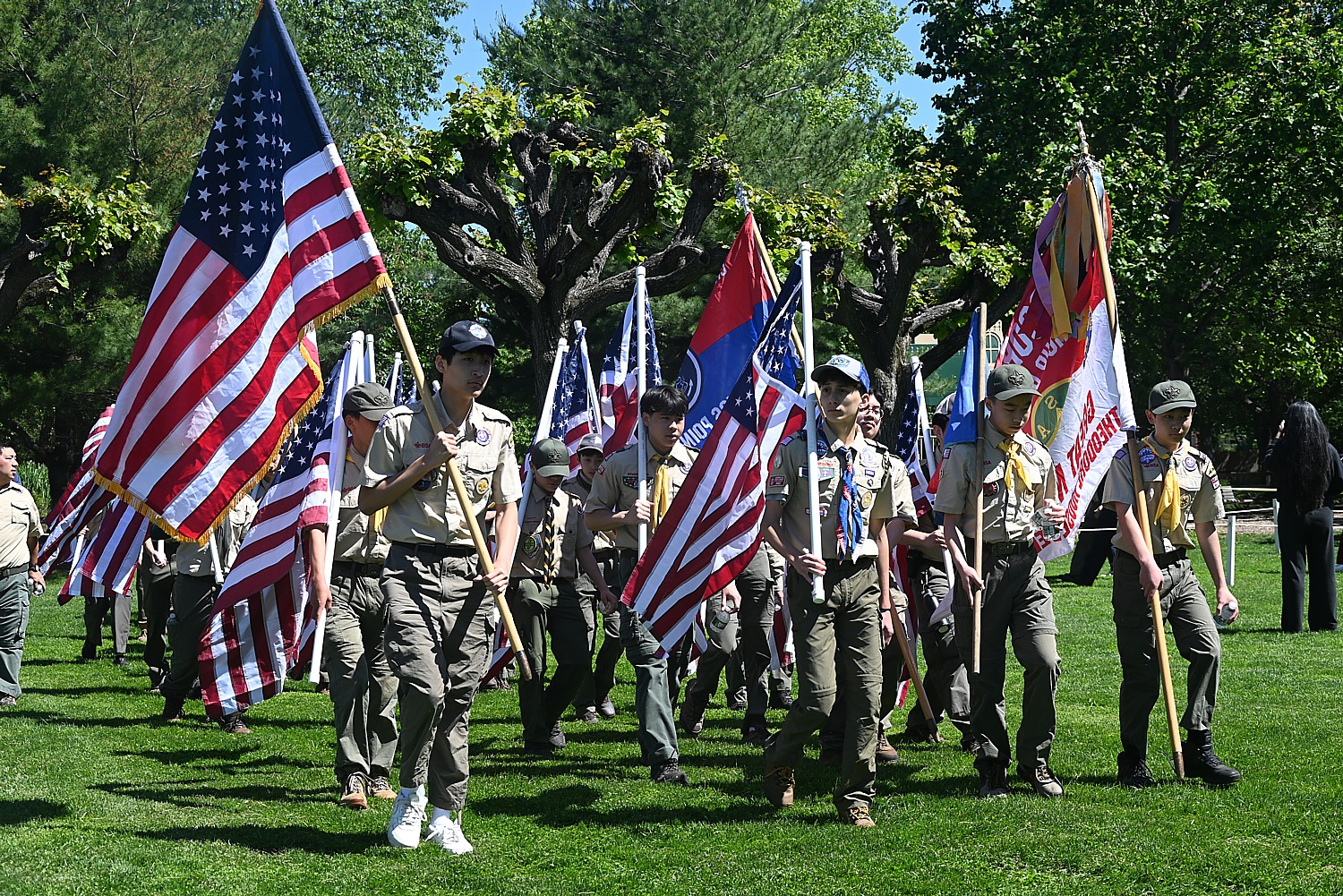 Great Neck Boy Scouts carry the American flag to the ceremony.