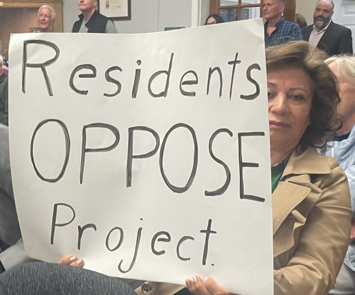 Residents packed Manorhaven village hall on Wednesday night to voice their concerns over a proposed mixed-use development site.