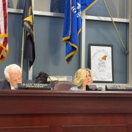 Glen Cove Mayor Pam Panzenbeck (R.) responds to resident concerns at the council meeting.