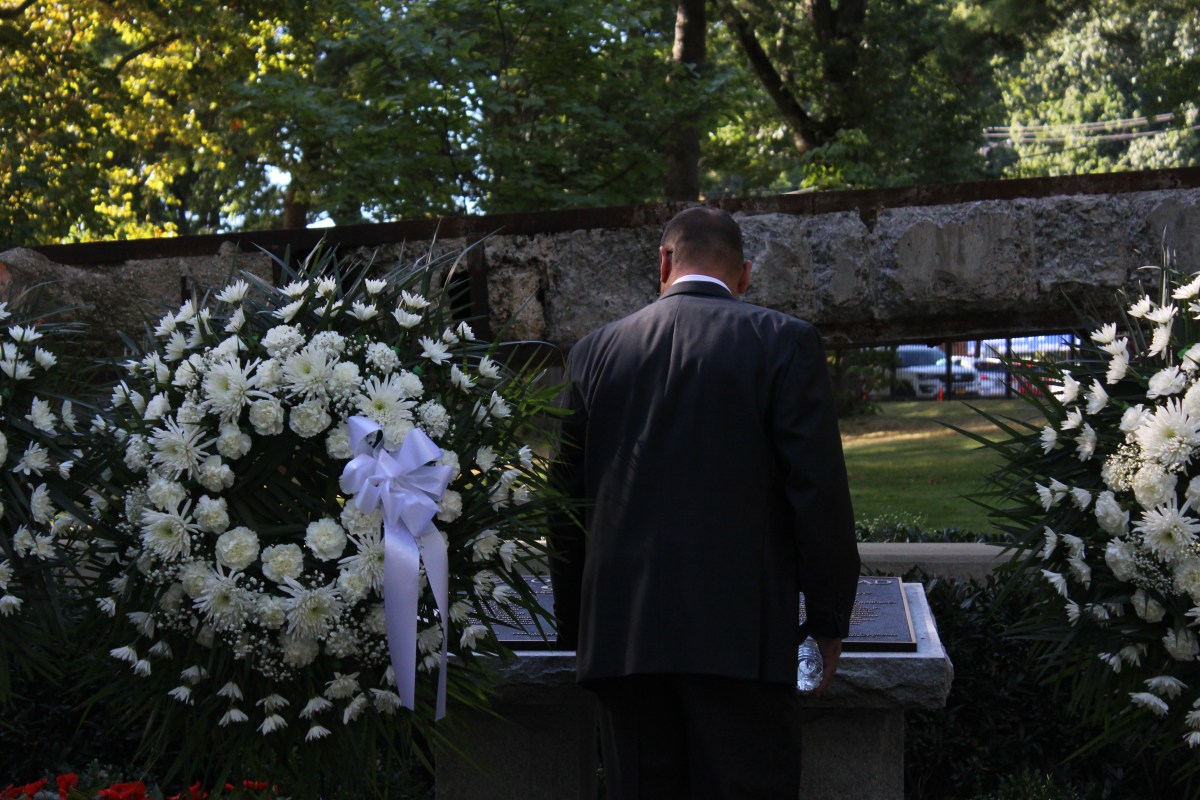 North Hempstead Town Council Member Ed Scott, a first responder in the 9/11 terrorist attack, standing in front of the town's 9/11 memorial at the 2024 memorial ceremony.