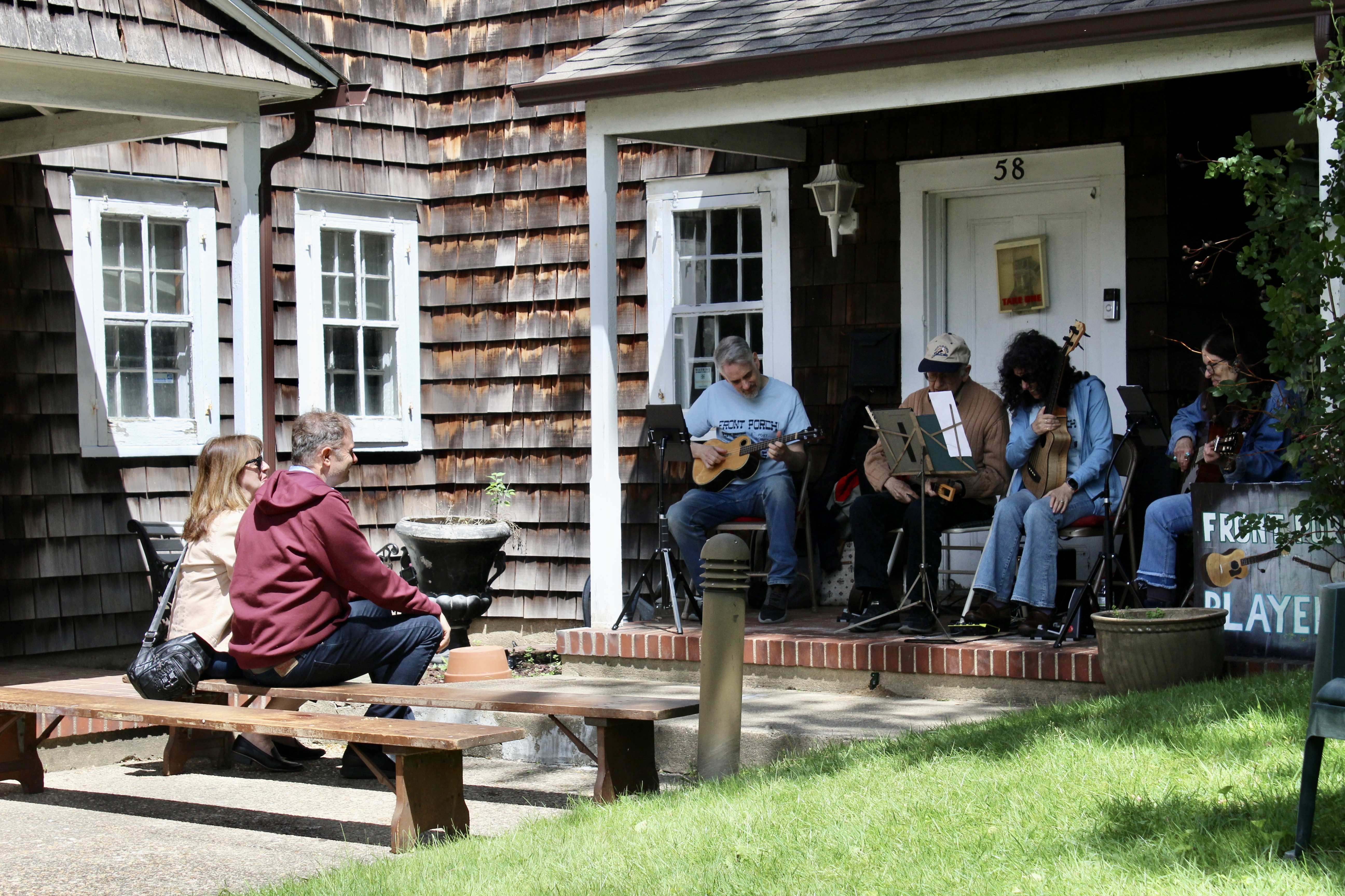 Residents listen to the Front Porch Players perform.
