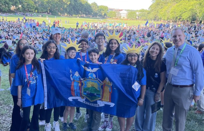 History Day Coordinators Theresa Cantwell and Brian Dussell with Jericho middle and high schoolers at New York State History Day.
