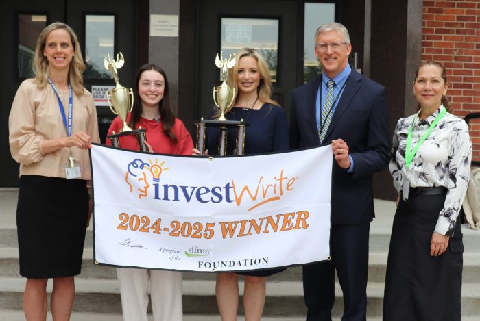 A sophomore Schreiber High School student won first place in the state and nationally for her essay her experience playing The Stock Market Game.