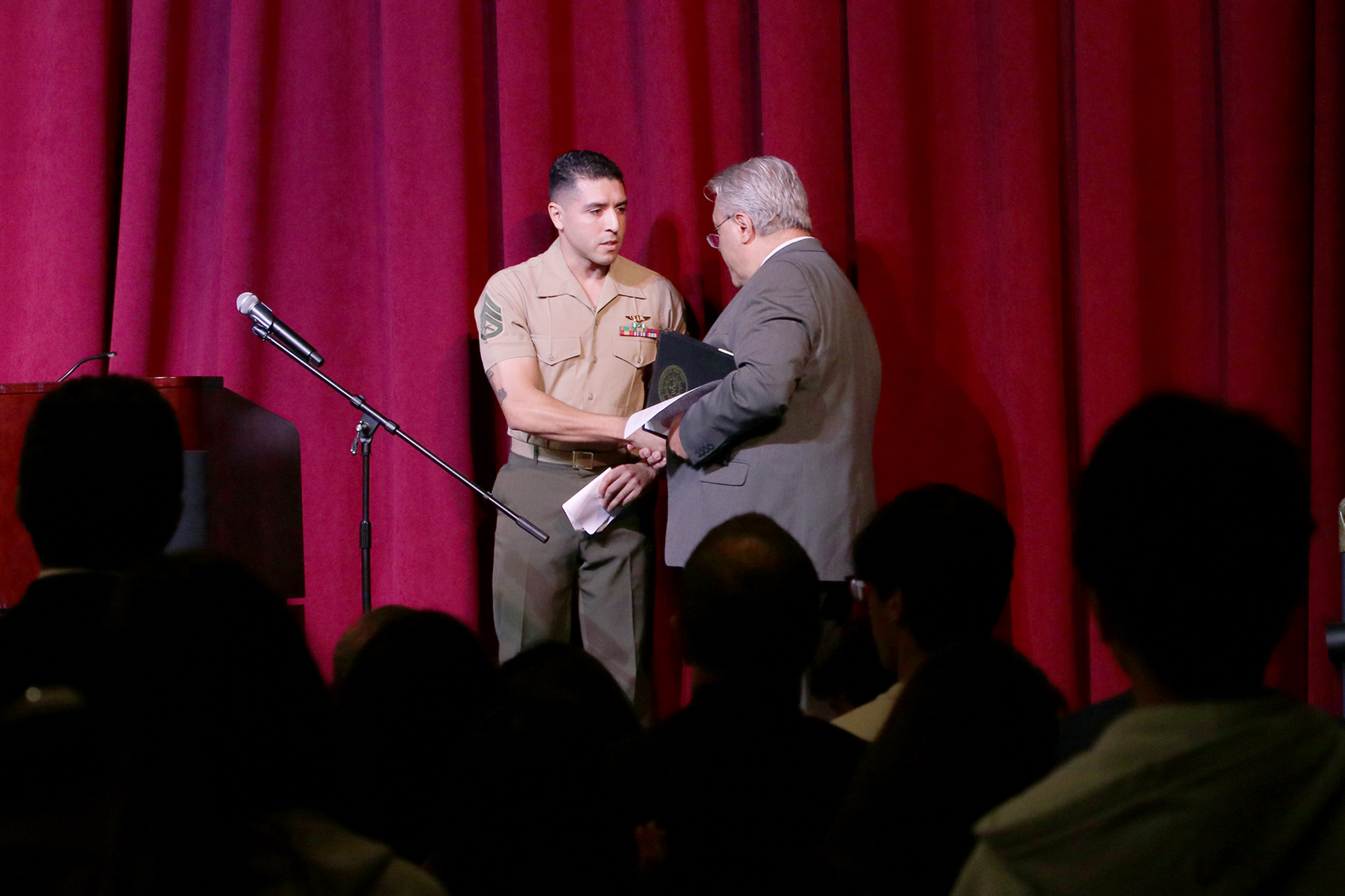 Staff Sgt. Carlos E. Gallo Jr. presented with an award.
