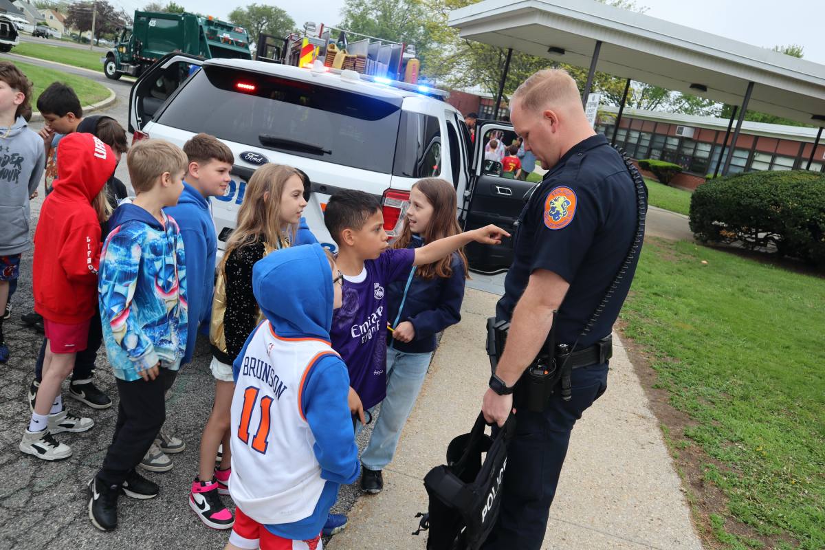 Students interacted with Nassau County Police Department officers during the annual Career Day on May 5.