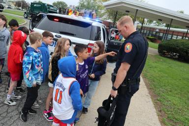 Students interacted with Nassau County Police Department officers during the annual Career Day on May 5.