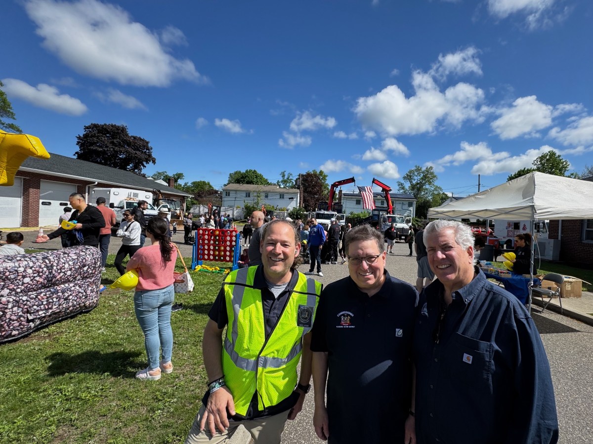 Plainview Water District Commissioner Marc Laykind, Commissioner Andrew Bader and Commissioner Michael Chad (L. to R.) at the Plainview Water District's Touch-a-Truck Event.
