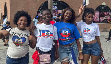Attendees dressed to represent Haiti at the town's Haitian Flag Day celebration on Sunday, May 18.