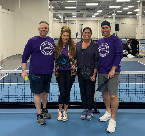 Arthur Ettinger, Chistina Shaw, Noelle and Michael Rogers (L. to R.) raise funds for Alzheimer's research through a friendly tournament at The Pickle Complex in Syosset.